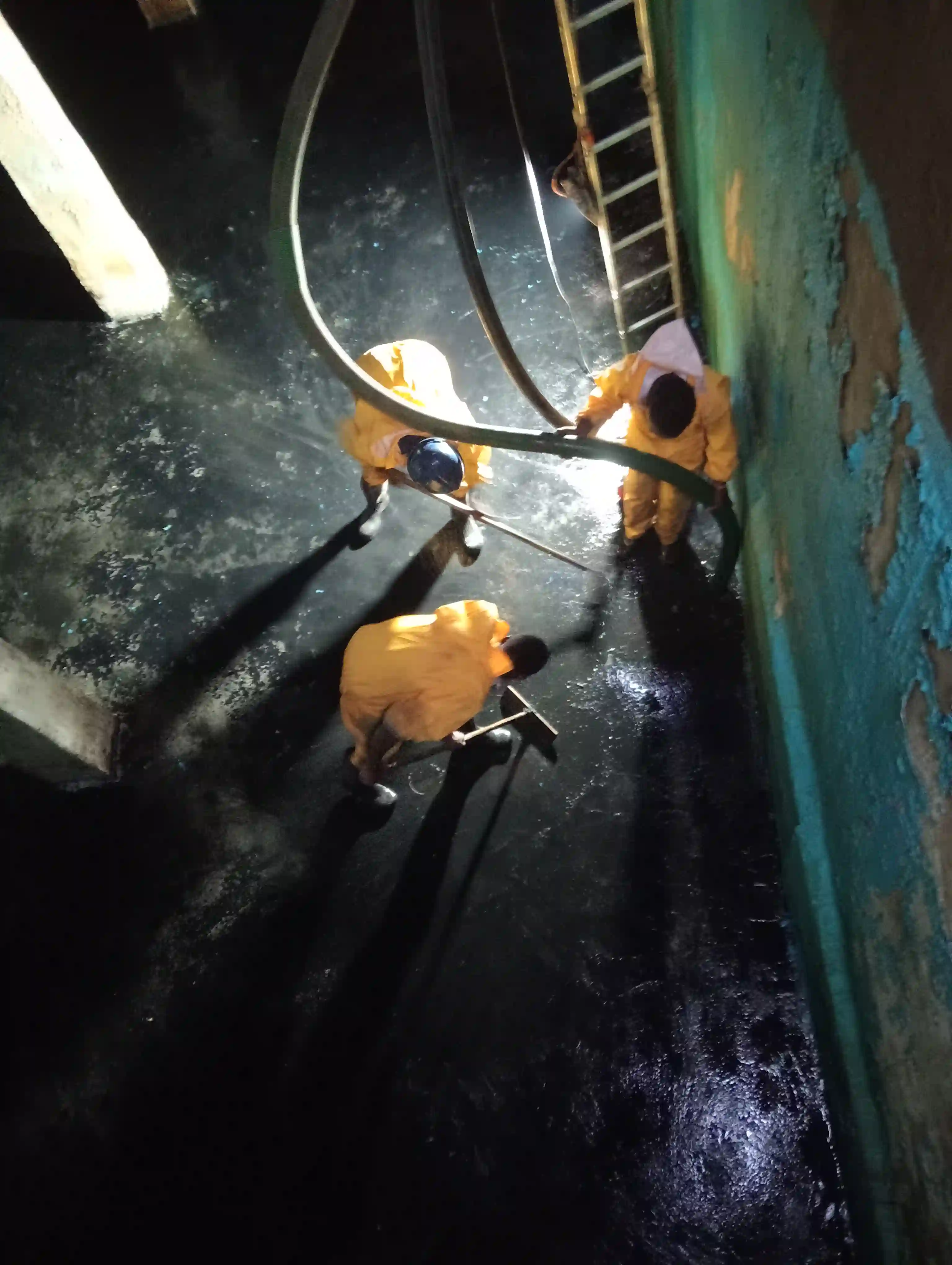 Septic tank cleaning equipment in use