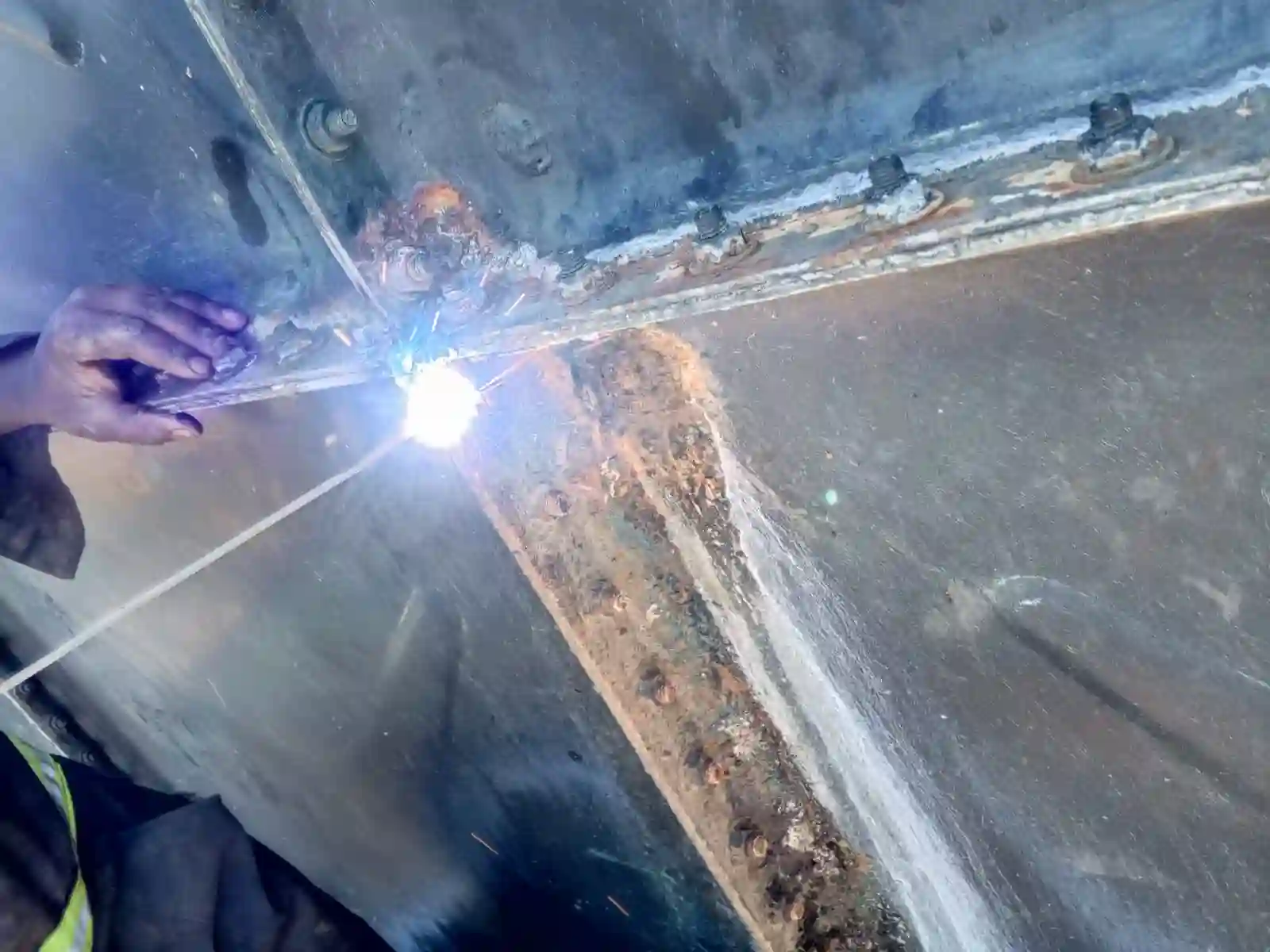 Steel water tank repair in progress